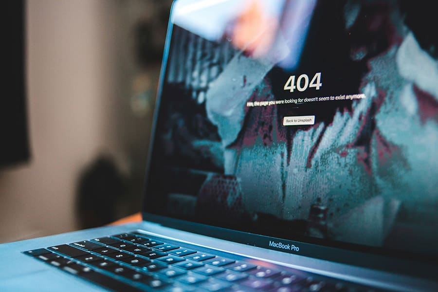 Computer screen displaying a website with a 404 Not Found error
